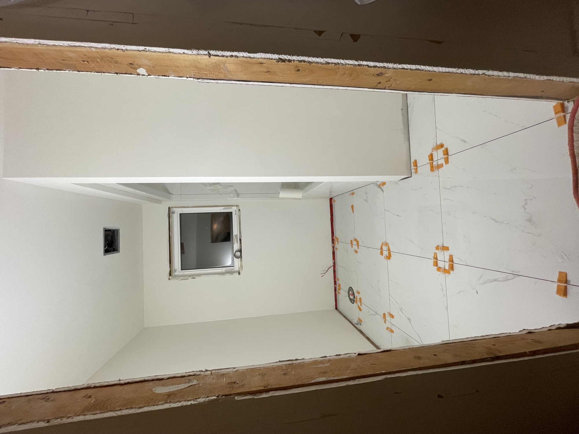 Luxury bathroom with large tile work.