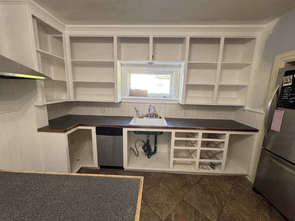 Kitchen cabinetry restoration and finishing.