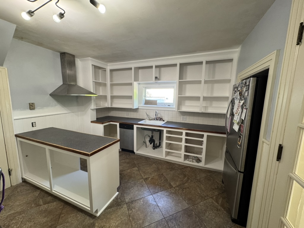 Kitchen cabinetry restoration and finishing.